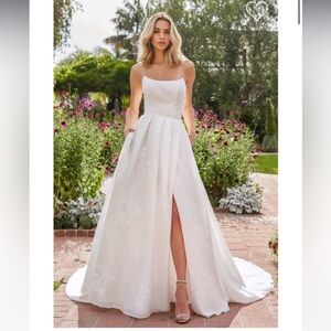 Romantic Organza Wedding Dress with Subtle Floral Design